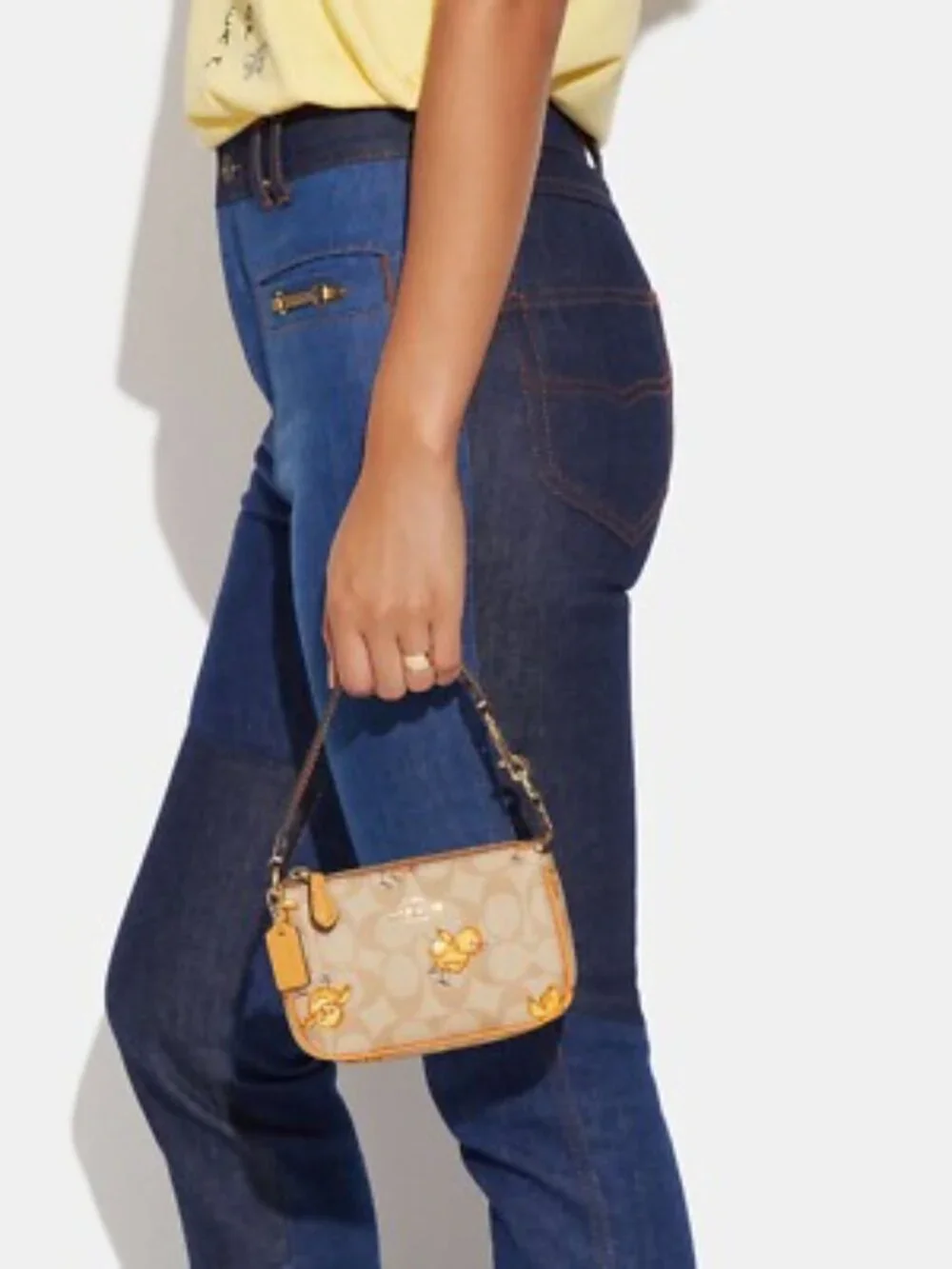 Coach Nolita Signature Canvas Wristlet Chick Print CC419